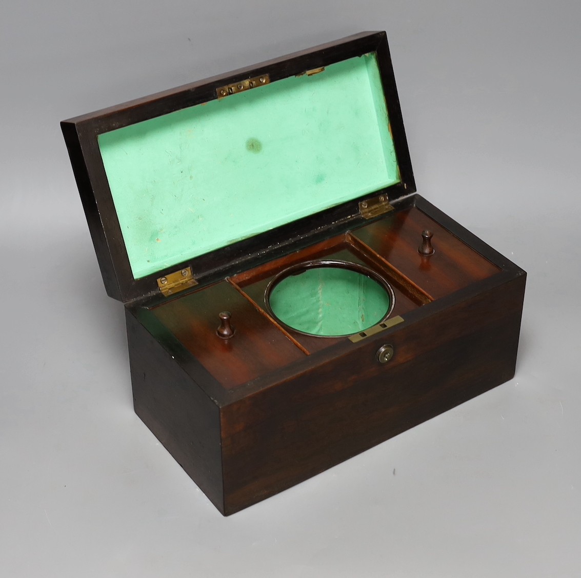A 19th century rosewood tea caddy and a mahogany cutlery tray